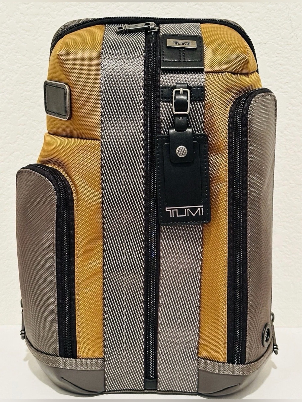 Brand New with Tag TUMI Higgins Sling Golden Brown Gray